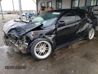 2010 Mitsubishi Lancer GTS with VIN JA32U8FW7AU001727, listed as a Copart auction lot 48228595 with 197,511 mi miles and Salvage Title. Bid and sale history available at carsss.com. Image 1.