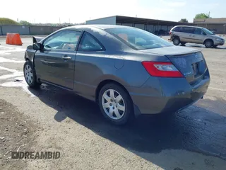 2009 Honda Civic Cpe LX with VIN 2HGFG12699H540664, listed as a IAAI auction lot 42100966 with Not Provided miles. Bid and sale history available at carsss.com. Image 3.