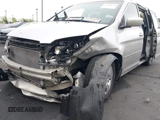 2007 Honda Odyssey EX-L with VIN 5FNRL38687B423865, listed as a IAAI auction lot 42190749 with 215,664 mi miles and . Bid and sale history available at DreamBid. Image 6.
