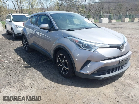 2018 Toyota C-HR XLE z VIN NMTKHMBX5JR046679, wystawiony jako IAAI lot #42068046 z przebiegiem 166 297 mil mil oraz . Historia ofert i sprzedaży dostępna na DreamBid. Obrazek 1.