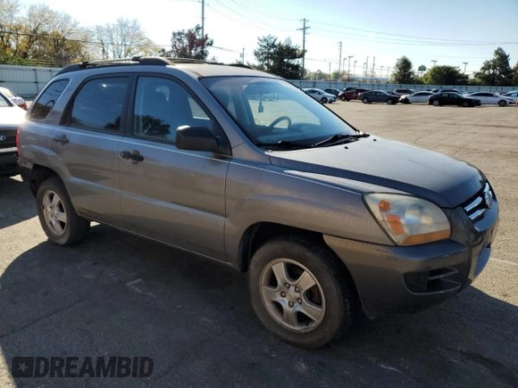 2006 Kia Sportage LX z VIN KNDJF724467197542, wystawiony jako Copart lot #75233464 z przebiegiem 204 570 mil mil oraz Czysty tytuł • Clean title. Historia ofert i sprzedaży dostępna na DreamBid. Obrazek 4.