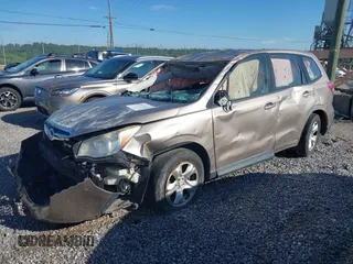 2014 Subaru Forester 2.5i with VIN JF2SJAAC3EG523338, listed as a IAAI auction lot 39376603 with 112,980 mi miles. Bid and sale history available at carsss.com. Image 2.