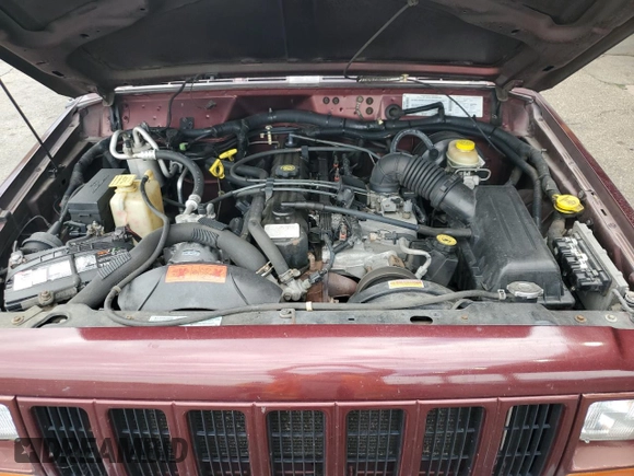 2000 Jeep Cherokee with VIN 1J4FF48SXYL198290, listed as a Copart auction lot 66026705 with 201,409 mi miles and Clean title. Bid and sale history available at DreamBid. Image 11.
