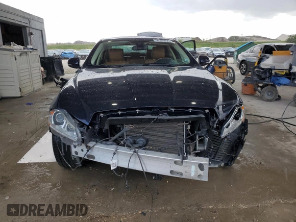 2015 Jaguar XJ Portfolio with VIN SAJWJ2GD2F8V90287, listed as a Copart auction lot 50291095 with 46,917 mi miles and Salvage title. Bid and sale history available at DreamBid. Image 5.