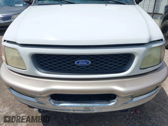 1997 Ford F-150 с VIN 1FTDX08W3VKD14758, выставлен на аукционе IAAI как лот 42491545 с пробегом 154 640 миль миль и . История ставок и продаж доступна на DreamBid. Изображение 6.