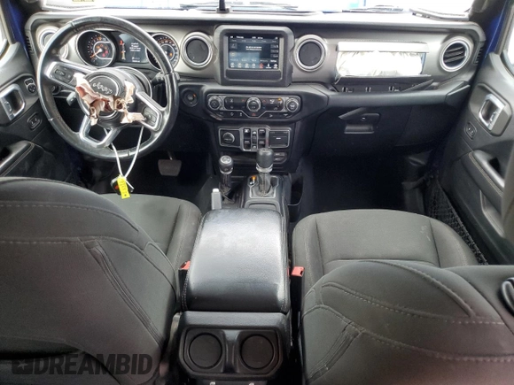 2018 Jeep Wrangler Unlimited Sahara with VIN 1C4HJXEG4JW215801, listed as a Copart auction lot 61774965 with 94,864 mi miles and Salvage title. Bid and sale history available at DreamBid. Image 8.