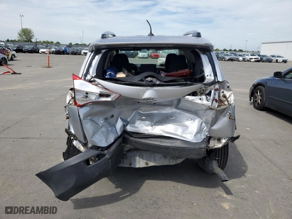 2014 Toyota RAV4 LE with VIN JTMZFREV4EJ013883, listed as a Copart auction lot 53100155 with 99,780 mi miles and Salvage Title. Bid and sale history available at carsss.com. Image 6.