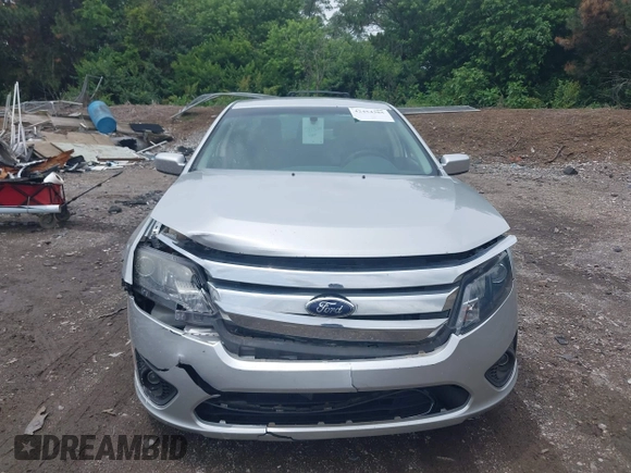 2012 Ford Fusion SE z VIN 3FAHP0HA3CR421636, wystawiony jako IAAI lot #42454385 z przebiegiem 138 282 mil mil oraz . Historia ofert i sprzedaży dostępna na DreamBid. Obrazek 12.