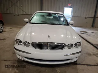 2004 Jaguar X-Type with VIN SAJEA51C34WE06046, listed as a Copart auction lot 56982105 with 69,265 mi miles and Clean Title. Bid and sale history available at DreamBid. Image 5.