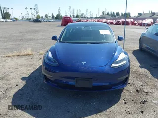 2023 Tesla Model 3 Long Range with VIN 5YJ3E1EB0PF620745, listed as a IAAI auction lot 42010603 with 39,846 mi miles and . Bid and sale history available at DreamBid. Image 13.