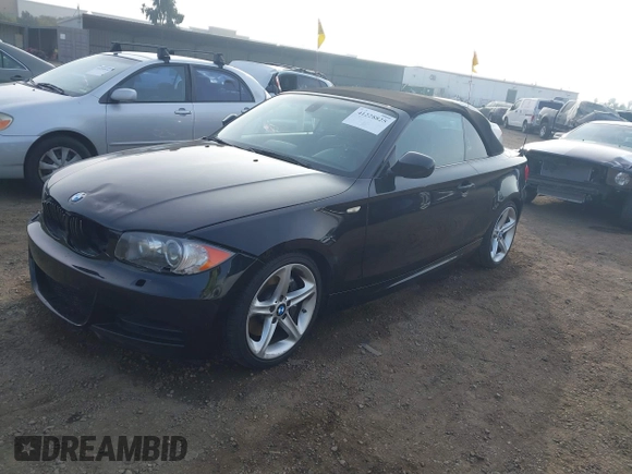 2010 BMW 1 Series 135i with VIN WBAUN9C54AVK41785, listed as a IAAI auction lot 41228825 with 60,817 mi miles and . Bid and sale history available at carsss.com. Image 17.