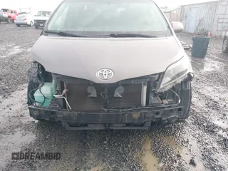 2015 Toyota Sienna SE with VIN 5TDXK3DC2FS540681, listed as a IAAI auction lot 41192481 with 108,782 mi miles and . Bid and sale history available at DreamBid. Image 6.