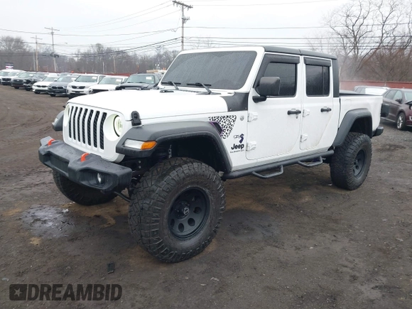 2020 Jeep Gladiator Sport S z VIN 1C6HJTAG0LL129461, wystawiony jako IAAI lot #41464713 z przebiegiem 66 625 mil mil oraz . Historia ofert i sprzedaży dostępna na DreamBid. Obrazek 19.