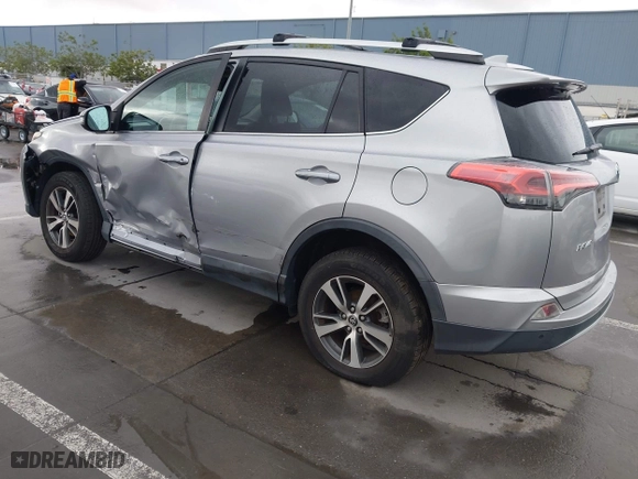 2016 Toyota RAV4 XLE with VIN 2T3WFREV7GW251931, listed as a IAAI auction lot 41906274 with 55,700 mi miles. Bid and sale history available at carsss.com. Image 3.