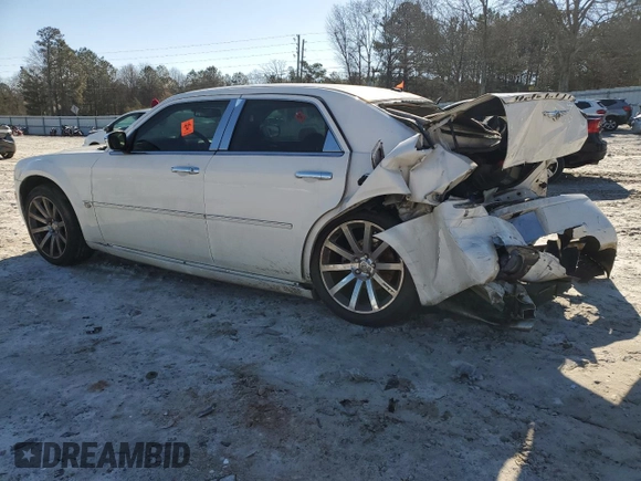 2006 Chrysler 300 C with VIN 2C3KA63H56H477106, listed as a Copart auction lot 48004705 with 174,593 mi miles and Salvage Title. Bid and sale history available at carsss.com. Image 2.