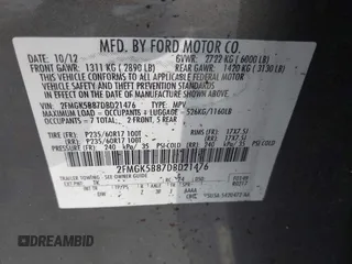 2013 Ford Flex SE with VIN 2FMGK5B87DBD21476, listed as a IAAI auction lot 41756454 with 164,089 mi miles. Bid and sale history available at carsss.com. Image 9.