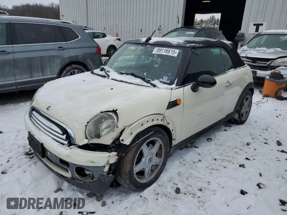 2010 MINI Convertible with VIN WMWMR3C50ATU97287, listed as a Copart auction lot 89116615 with 120,323 mi miles and Salvage Title. Bid and sale history available at DreamBid. Image 1.