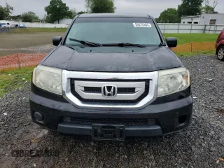 2010 Honda Pilot LX z VIN 5FNYF4H25AB029785, wystawiony jako Copart lot #56976365 z przebiegiem 170 842 mil mil oraz Szkoda całkowita • Salvage title. Historia ofert i sprzedaży dostępna na DreamBid. Obrazek 5.