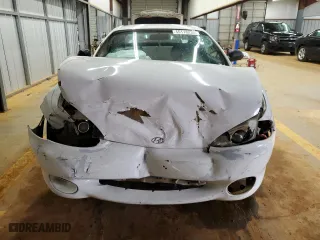 1997 Hyundai Tiburon with VIN KMHJG24M6VU052589, listed as a Copart auction lot 45118235 with 90,609 mi miles and Salvage Title. Bid and sale history available at carsss.com. Image 5.