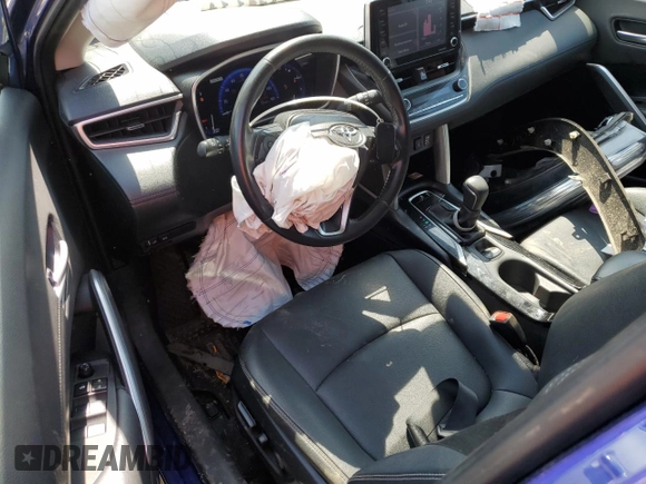 2022 Toyota Corolla Cross XLE with VIN 7MUDAABGXNV042443, listed as a Copart auction lot 57808565 with 102,887 mi miles and Salvage title. Bid and sale history available at DreamBid. Image 8.