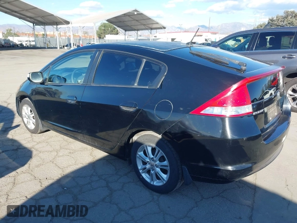 2010 Honda Insight EX with VIN JHMZE2H74AS012517, listed as a IAAI auction lot 41886588 with 227,428 mi miles and . Bid and sale history available at DreamBid. Image 3.