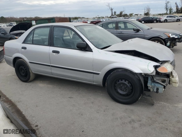 2001 Mazda Protege DX with VIN JM1BJ222310425181, listed as a Copart auction lot 88560255 with 201,942 mi miles and Salvage Title. Bid and sale history available at carsss.com. Image 4.