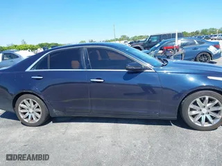 2016 Cadillac CTS Sedan RWD with VIN 1G6AP5SX8G0119984, listed as a IAAI auction lot 41679567 with 98,592 mi miles. Bid and sale history available at carsss.com. Image 13.
