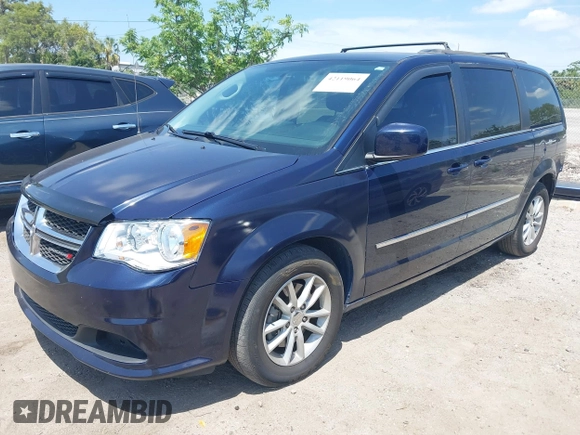 2014 Dodge Grand Caravan SXT with VIN 2C4RDGCG3ER266199, listed as a IAAI auction lot 42119064 with 148,067 mi miles and . Bid and sale history available at DreamBid. Image 18.