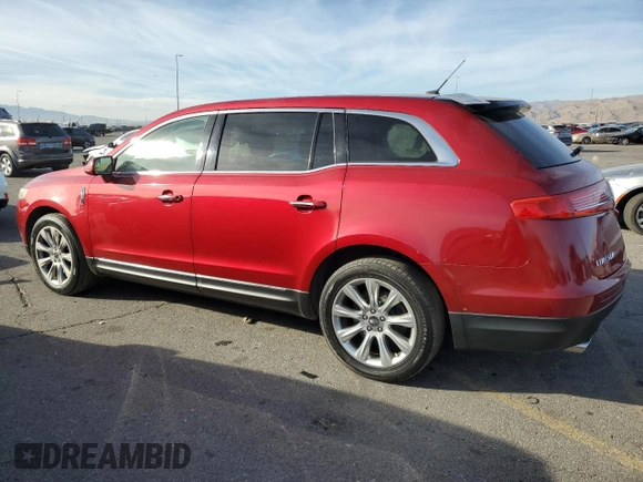 2014 Lincoln MKT with VIN 2LMHJ5FK0EBL50076, listed as a Copart auction lot 85914264 with 138,387 mi miles and Salvage Title. Bid and sale history available at DreamBid. Image 2.