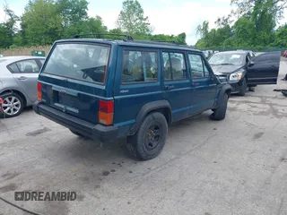 1996 Jeep Cherokee SE z VIN 1J4FJ28S8TL285634, wystawiony jako IAAI lot #42183816 z przebiegiem 260 237 mil mil oraz . Historia ofert i sprzedaży dostępna na DreamBid. Obrazek 4.