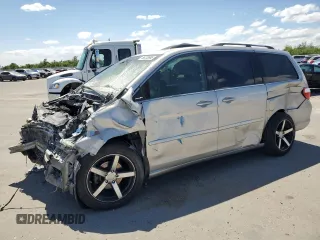 2005 Honda Odyssey Touring z VIN 5FNRL38875B015467, wystawiony jako Copart lot #56233665 z przebiegiem Nie podano mil oraz Szkoda całkowita • Salvage title. Historia ofert i sprzedaży dostępna na DreamBid. Obrazek 1.