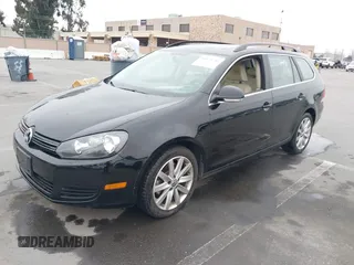 2012 Volkswagen Jetta SportWagen TDI with VIN 3VWPL7AJ3CM657816, listed as a IAAI auction lot 41473792 with 82,447 mi miles. Bid and sale history available at carsss.com. Image 2.
