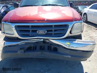 2001 Ford F-150 SuperCrew XLT with VIN 1FTRW07L11KE20412, listed as a IAAI auction lot 41877980 with 1 mi miles. Bid and sale history available at carsss.com. Image 6.