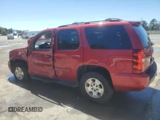 2012 Chevrolet Tahoe LS with VIN 1GNSCAE02CR319700, listed as a Copart auction lot 50321735 with 180,403 mi miles and Salvage title. Bid and sale history available at DreamBid. Image 2.