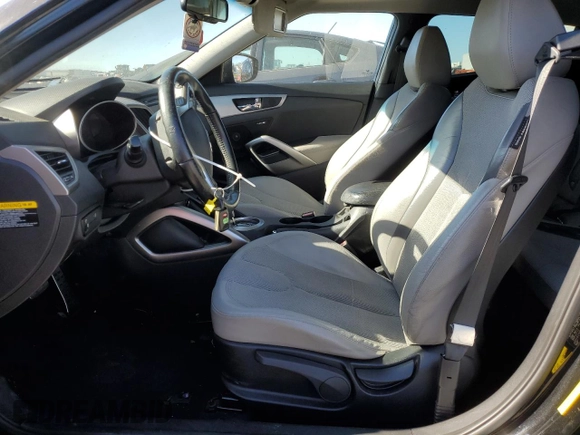 2012 Hyundai Veloster w/Gray Int with VIN KMHTC6AD9CU026260, listed as a Copart auction lot 87858115 with 89,939 mi miles and Salvage title. Bid and sale history available at DreamBid. Image 7.