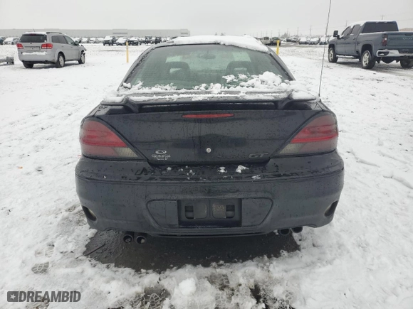 2004 Pontiac Grand Am GT with VIN 1G2NW52E14C173335, listed as a Copart auction lot 85103774 with 140,203 mi miles and Salvage Title. Bid and sale history available at carsss.com. Image 6.