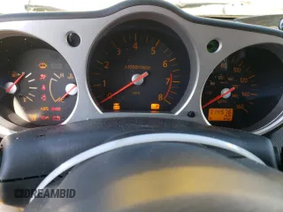 2005 Nissan 350Z Touring with VIN JN1AZ34E55M655680, listed as a Copart auction lot 74091984 with 114,576 mi miles and Salvage Title. Bid and sale history available at DreamBid. Image 9.