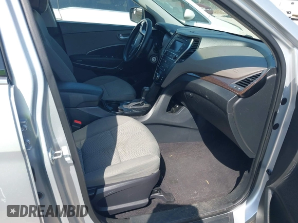 2018 Hyundai Santa Fe 2.4L z VIN 5XYZTDLB9JG513584, wystawiony jako IAAI lot #42031291 z przebiegiem 131 109 mil mil oraz . Historia ofert i sprzedaży dostępna na DreamBid. Obrazek 5.