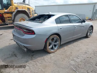 2015 Dodge Charger SXT with VIN 2C3CDXHG2FH768681, listed as a IAAI auction lot 39939245 with Not Provided miles and . Bid and sale history available at DreamBid. Image 4.