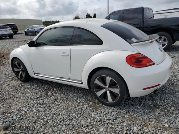2012 Volkswagen Beetle 2.0T Turbo w/Sun/Sound PZEV with VIN 3VWVA7AT2CM619430, listed as a Copart auction lot 79994774 with 133,927 mi miles and Clean Title. Bid and sale history available at carsss.com. Image 2.