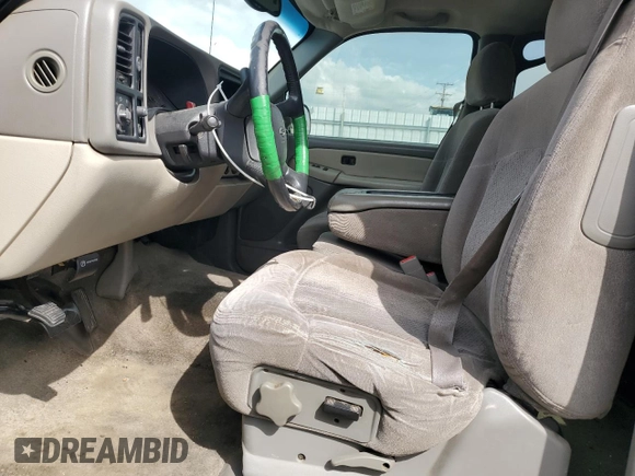 2002 Chevrolet Tahoe LS with VIN 1GNEC13T22R268336, listed as a Copart auction lot 50947675 with 238,425 mi miles and Salvage title. Bid and sale history available at DreamBid. Image 7.