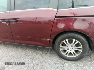 2013 Honda Odyssey LX с VIN 5FNRL5H23DB052215, выставлен на аукционе IAAI как лот 42389009 с пробегом 103 933 миль миль и . История ставок и продаж доступна на DreamBid. Изображение 6.