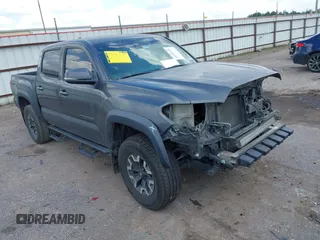 2019 Toyota Tacoma SR with VIN 3TMCZ5AN7KM270997, listed as a IAAI auction lot 42227351 with 190,822 mi miles and . Bid and sale history available at DreamBid. Image 1.