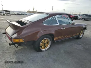 1975 Porsche 911 with VIN 9115201599, listed as a Copart auction lot 79267654 with 69,699 mi miles and Salvage title. Bid and sale history available at DreamBid. Image 3.