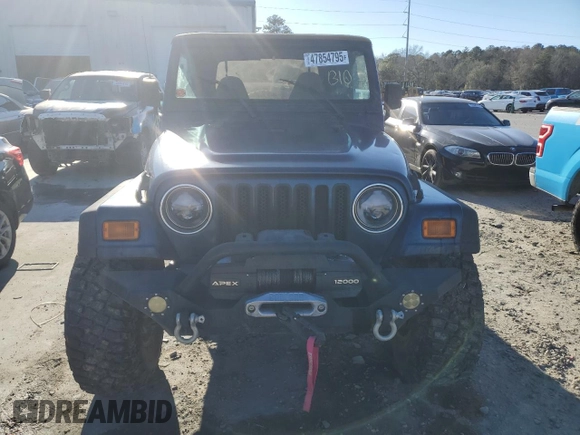 2000 Jeep Wrangler Sport with VIN 1J4FA49S7YP802304, listed as a Copart auction lot 47854795 with 0 mi miles and Salvage Title. Bid and sale history available at carsss.com. Image 5.