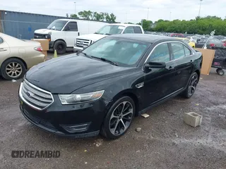 2015 Ford Taurus SEL z VIN 1FAHP2E81FG116032, wystawiony jako IAAI lot #42188269 z przebiegiem 178 774 mil mil oraz . Historia ofert i sprzedaży dostępna na DreamBid. Obrazek 18.