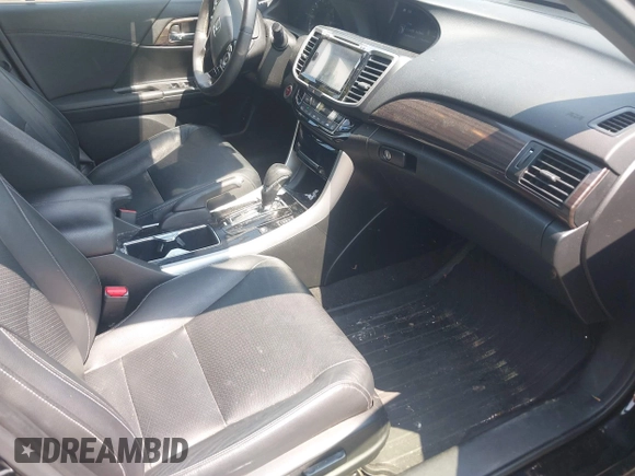 2017 Honda Accord Touring with VIN JHMCR6F74HC005706, listed as a IAAI auction lot 42585878 with 158,388 mi miles and . Bid and sale history available at DreamBid. Image 5.