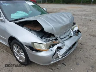 2002 Honda Accord SE z VIN 1HGCG56792A109226, wystawiony jako IAAI lot #42155995 z przebiegiem 238 789 mil mil oraz . Historia ofert i sprzedaży dostępna na DreamBid. Obrazek 17.