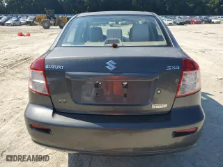 2011 Suzuki SX4 LE with VIN JS2YC5A27B6304410, listed as a Copart auction lot 72119824 with 118,357 mi miles and Salvage Title. Bid and sale history available at carsss.com. Image 6.