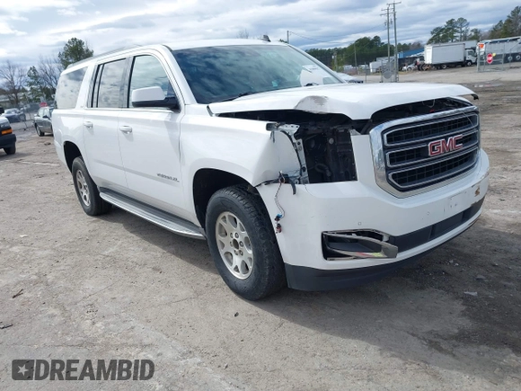 2015 GMC Yukon XL SLT with VIN 1GKS1HKC7FR126375, listed as a IAAI auction lot 41689017 with 218,622 mi miles. Bid and sale history available at carsss.com. Image 1.